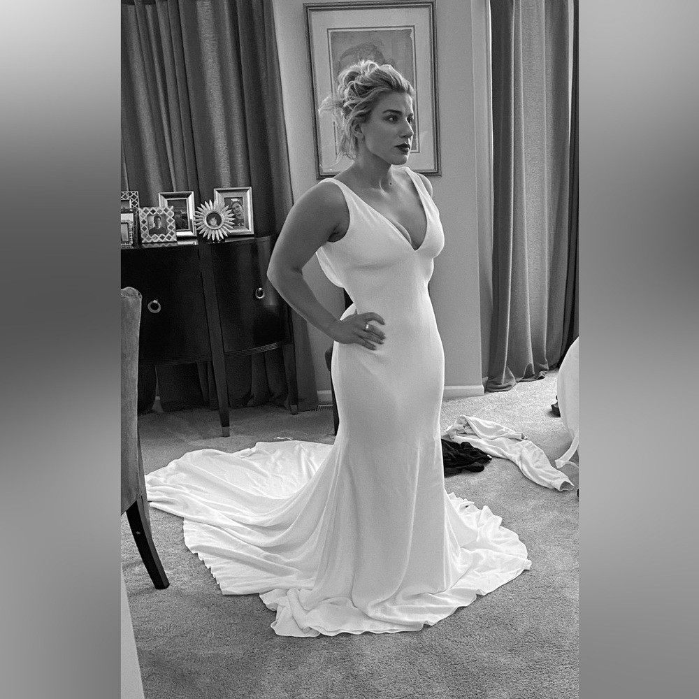 Runaway bride’s wedding dress!   Never worn, only tried on a few times.